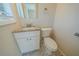 Updated bathroom with granite countertop, white vanity, and tile flooring at 3488 Brookfield Ln, Decatur, GA 30032