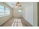 Bedroom with carpet flooring, ceiling fan, and double door closet at 3488 Brookfield Ln, Decatur, GA 30032