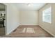 Bright dining area with hardwood flooring and a view of the kitchen at 3488 Brookfield Ln, Decatur, GA 30032