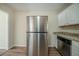 Stainless steel refrigerator in a newly remodeled kitchen at 3488 Brookfield Ln, Decatur, GA 30032