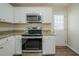 Modern kitchen with stainless steel appliances and granite countertops at 3488 Brookfield Ln, Decatur, GA 30032