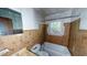 Bathroom with shower/tub and wood paneling at 410 Picketts Mill Rd, Dallas, GA 30157