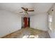 Large bedroom with ceiling fan and window at 410 Picketts Mill Rd, Dallas, GA 30157