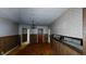 Dining room features wood paneling and wall-to-wall carpet at 410 Picketts Mill Rd, Dallas, GA 30157