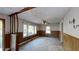 Living room with wood paneling and carpet at 410 Picketts Mill Rd, Dallas, GA 30157