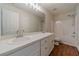 Bathroom boasts double vanity and shower/tub combo at 910 Callee Dr, Loganville, GA 30052