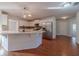 Modern kitchen with white cabinets, quartz countertops, and stainless steel appliances at 910 Callee Dr, Loganville, GA 30052