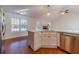 Modern kitchen with island and stainless steel appliances at 910 Callee Dr, Loganville, GA 30052