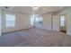 Main bedroom features carpet, tray ceiling and access to bath at 910 Callee Dr, Loganville, GA 30052