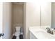 Half bathroom with modern sink, faucet, and paint at 85 Woodfin Way, Social Circle, GA 30025