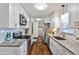 Bright kitchen with granite countertops, stainless steel appliances, and white cabinets at 1825 Beckett Dr, Marietta, GA 30062