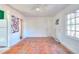 Living room with hardwood floors and access to exterior at 1029 Cheaves St, Forest Park, GA 30297