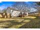 Spacious backyard with wooden deck and fenced perimeter at 1419 Byrere Sw Ter, Atlanta, GA 30310