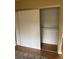 Bedroom closet with sliding doors and shelving at 64 Goldrush Cir, Atlanta, GA 30328