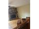 Living room with stone fireplace and hardwood floors at 64 Goldrush Cir, Atlanta, GA 30328