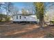 Charming home with a spacious backyard and mature trees at 2178 Baker Nw Ter, Atlanta, GA 30318