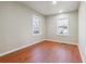 Simple bedroom with hardwood floors and neutral walls at 2178 Baker Nw Ter, Atlanta, GA 30318