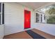 Inviting front porch with a red door and screened enclosure at 2178 Baker Nw Ter, Atlanta, GA 30318