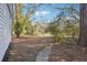 Side yard with a pathway leading to the backyard at 2178 Baker Nw Ter, Atlanta, GA 30318