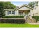 Charming craftsman home with stone steps and well-manicured lawn at 2215 Edison Ne Ave, Atlanta, GA 30305