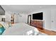 Main bedroom features a barn door to the closet and hardwood floors at 240 Pinebrook Way, Roswell, GA 30076