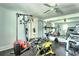 Home gym with various equipment including stationary bike and weight machine at 3545 Fairway Dr, Atlanta, GA 30337