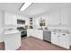 Updated kitchen featuring white cabinets and stainless steel appliances at 1609 N County Line Rd, Lithia Springs, GA 30122