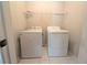 Laundry room with washer and dryer, and shelving at 406 Trinkle Ct, Stockbridge, GA 30281