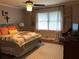 Cozy bedroom with hardwood floors, lots of natural light, and charming decor accents at 747 Dogwood Cir, Norcross, GA 30071