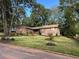 Brick ranch home with landscaped yard at 747 Dogwood Cir, Norcross, GA 30071