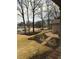 Beautifully landscaped front yard with stairs and lush lawn, creating an inviting entrance at 747 Dogwood Cir, Norcross, GA 30071