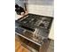 Stainless steel gas range with five burners at 747 Dogwood Cir, Norcross, GA 30071