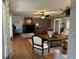 Comfortable living room featuring hardwood floors, ceiling fan, and stylish decor at 747 Dogwood Cir, Norcross, GA 30071