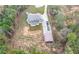 Aerial view showcasing house and detached garage at 2647 Old Snapping Shoals Rd, Mcdonough, GA 30252