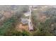 Aerial view of house, detached garage, and large lot at 2647 Old Snapping Shoals Rd, Mcdonough, GA 30252