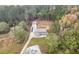 Aerial view of house, detached garage, and driveway at 2647 Old Snapping Shoals Rd, Mcdonough, GA 30252