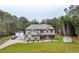 Two-story house, detached garage, and storage shed on a wooded lot at 2647 Old Snapping Shoals Rd, Mcdonough, GA 30252