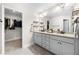 Double vanity bathroom with a walk-in closet at 2647 Old Snapping Shoals Rd, Mcdonough, GA 30252