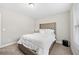 Cozy bedroom featuring a comfortable bed and ample natural light at 2647 Old Snapping Shoals Rd, Mcdonough, GA 30252