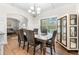 Dining room with table, chairs, and china cabinet at 2647 Old Snapping Shoals Rd, Mcdonough, GA 30252
