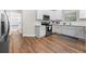 Modern kitchen with white cabinets, stainless steel appliances, and granite countertops at 2647 Old Snapping Shoals Rd, Mcdonough, GA 30252