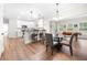 Modern kitchen with white cabinets, stainless steel appliances, and granite countertops at 2647 Old Snapping Shoals Rd, Mcdonough, GA 30252