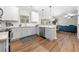 Modern kitchen with white cabinets, stainless steel appliances, and granite countertops at 2647 Old Snapping Shoals Rd, Mcdonough, GA 30252