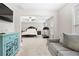 Main bedroom with sitting area and a view into the bedroom at 2647 Old Snapping Shoals Rd, Mcdonough, GA 30252