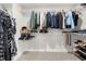 Large walk-in closet with ample shelving and hanging space at 2647 Old Snapping Shoals Rd, Mcdonough, GA 30252