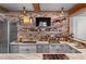 Finished basement bar featuring a brick backsplash, shelving, stainless steel appliances, and granite countertops at 5330 Lake Redwine Nw Cv, Acworth, GA 30101