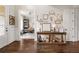 Elegant foyer with hardwood floors, decorative console table, and views into the adjacent office space at 5330 Lake Redwine Nw Cv, Acworth, GA 30101