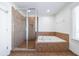 Bathroom with shower and garden tub at 970 Samples Nw Ln, Atlanta, GA 30318