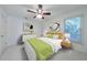 Bedroom with light green bedding and wooden accents at 970 Samples Nw Ln, Atlanta, GA 30318
