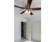 Bright bedroom with ceiling fan, two closets, and access to hallway at 970 Samples Nw Ln, Atlanta, GA 30318